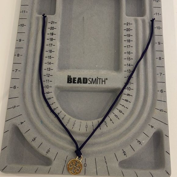 Tory Burch charm Necklace - Picture 3 of 3